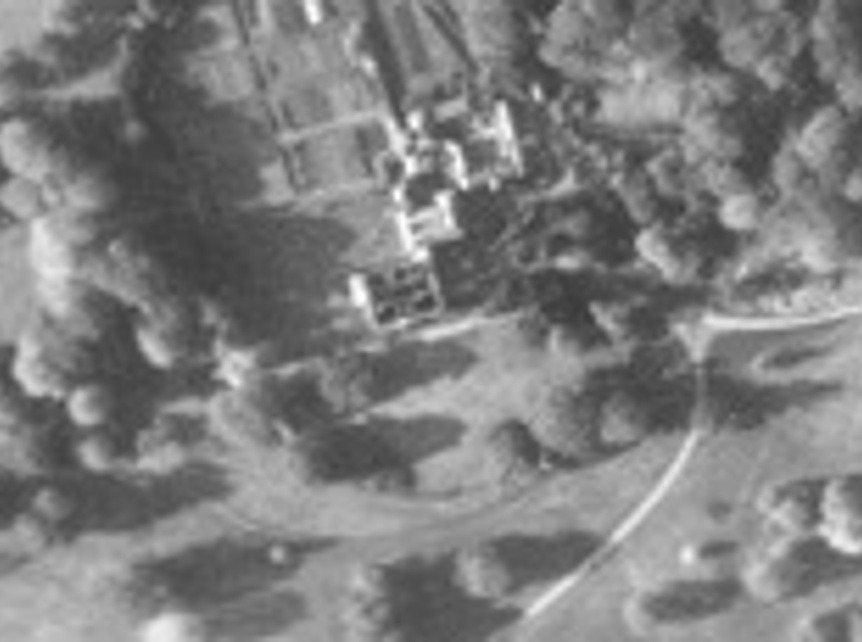 Aerial view of Fredville House in November of 1942. The fire damage to the roof is clearly visible.